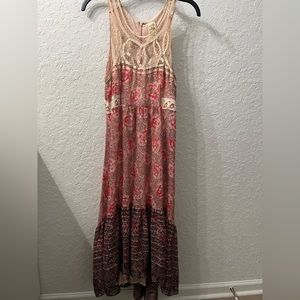 FREE PEOPLE High/low fit and flare midi dress.